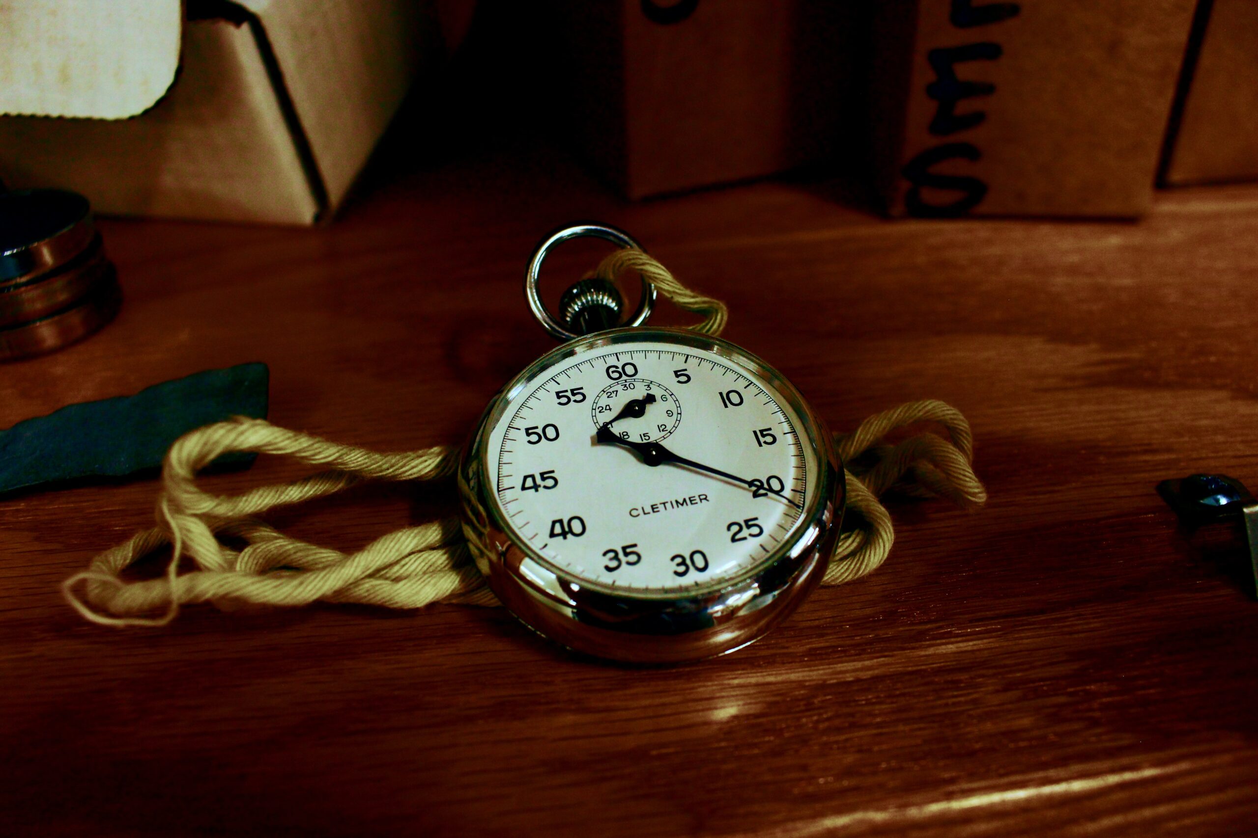 Photo by Shawn Stutzman: https://www.pexels.com/photo/white-pocket-watch-with-gold-colored-frame-on-brown-wooden-board-1010513/